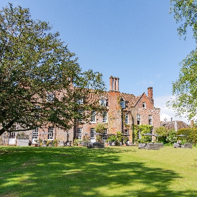 Hintlesham Hall is surrounded by peaceful mature gardens