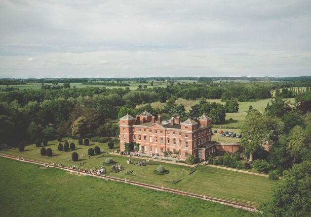 Kimberley Hall, aerial view of the estate with house centre of parkland