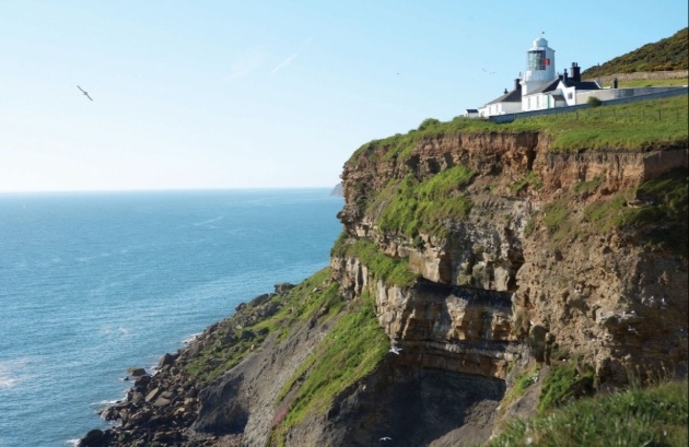 light house on edge of cliff