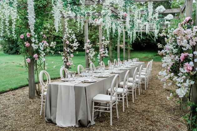 wedding reception table set up in a garden
