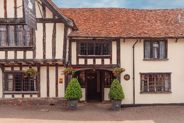 outside of old hotel cream facade with wooden beams