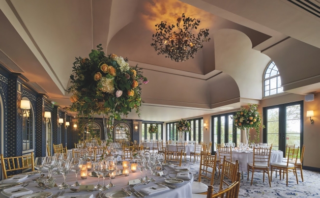 wedding reception room with art deco interior and floor to ceiling windows
