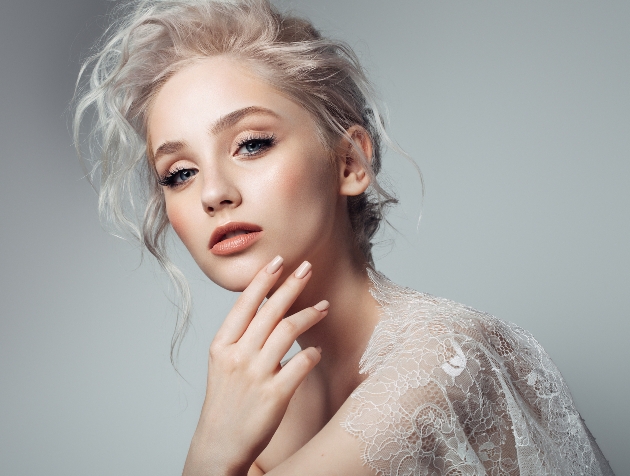 young model with grey hair in a wedding dress
