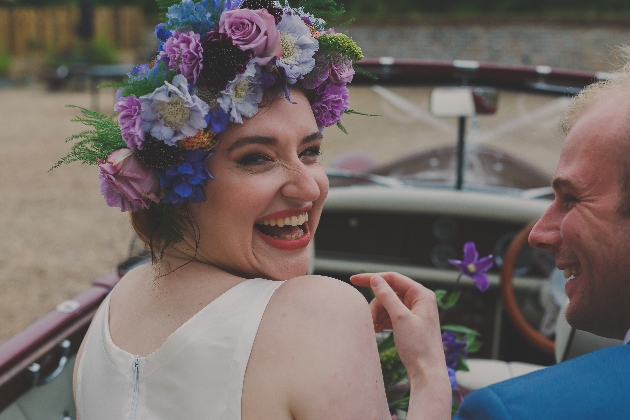 Bride wearing a flowercrown laughing