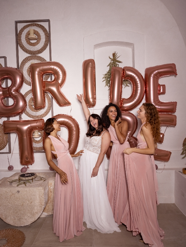 I'm a Barbie Girl-inspired Veerle dress and pink multi-way bridesmaids dresses by Modeca