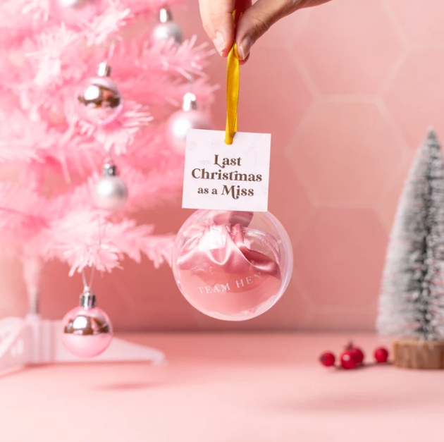 plastic bauble to hanging on tree with choice of gift inside