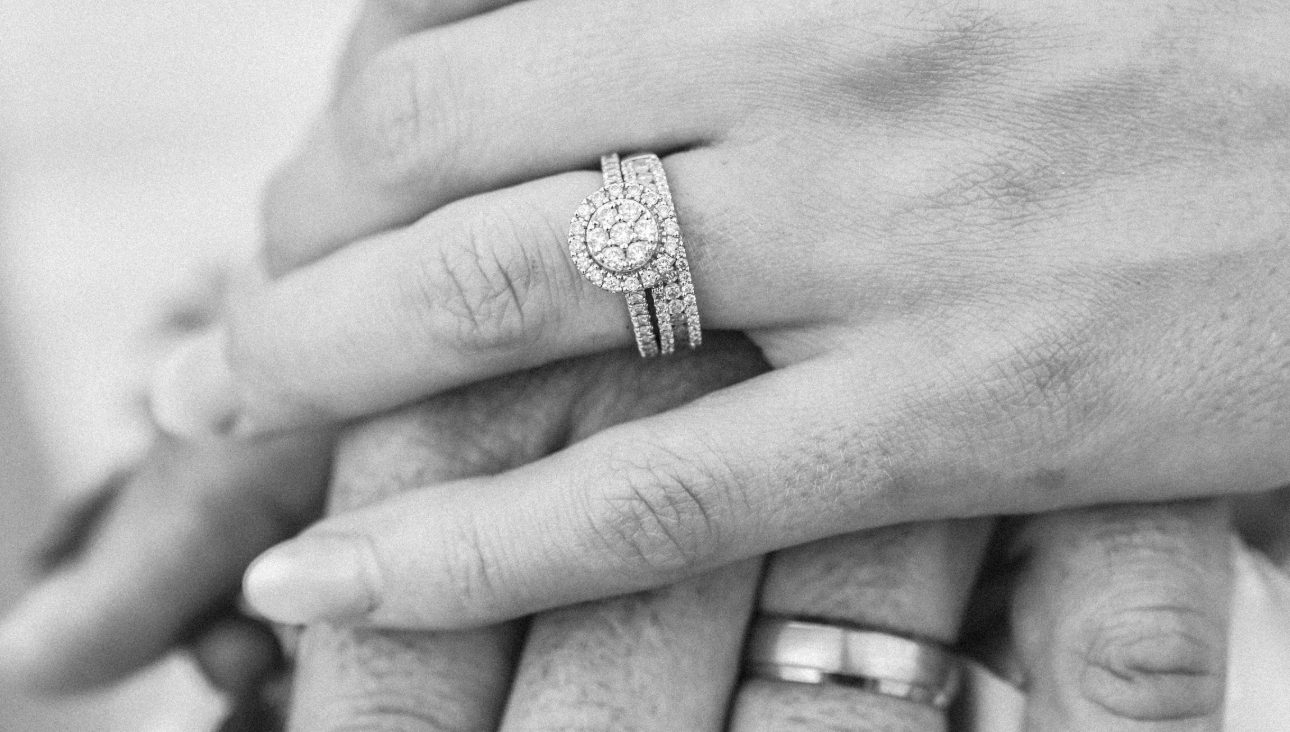 Bride and groom holding hands