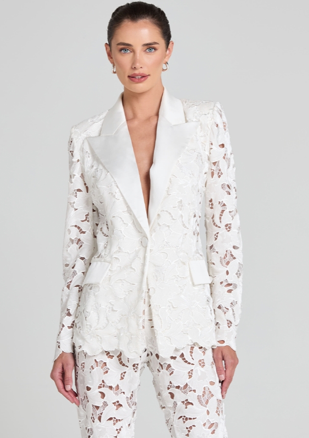 woman in lace suit