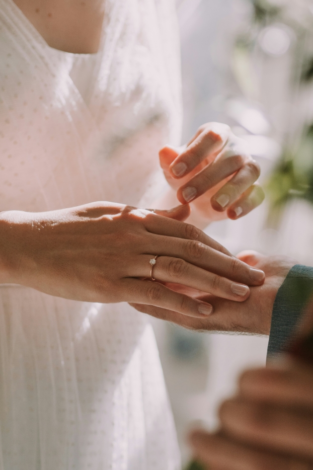 man and woman holding hands 