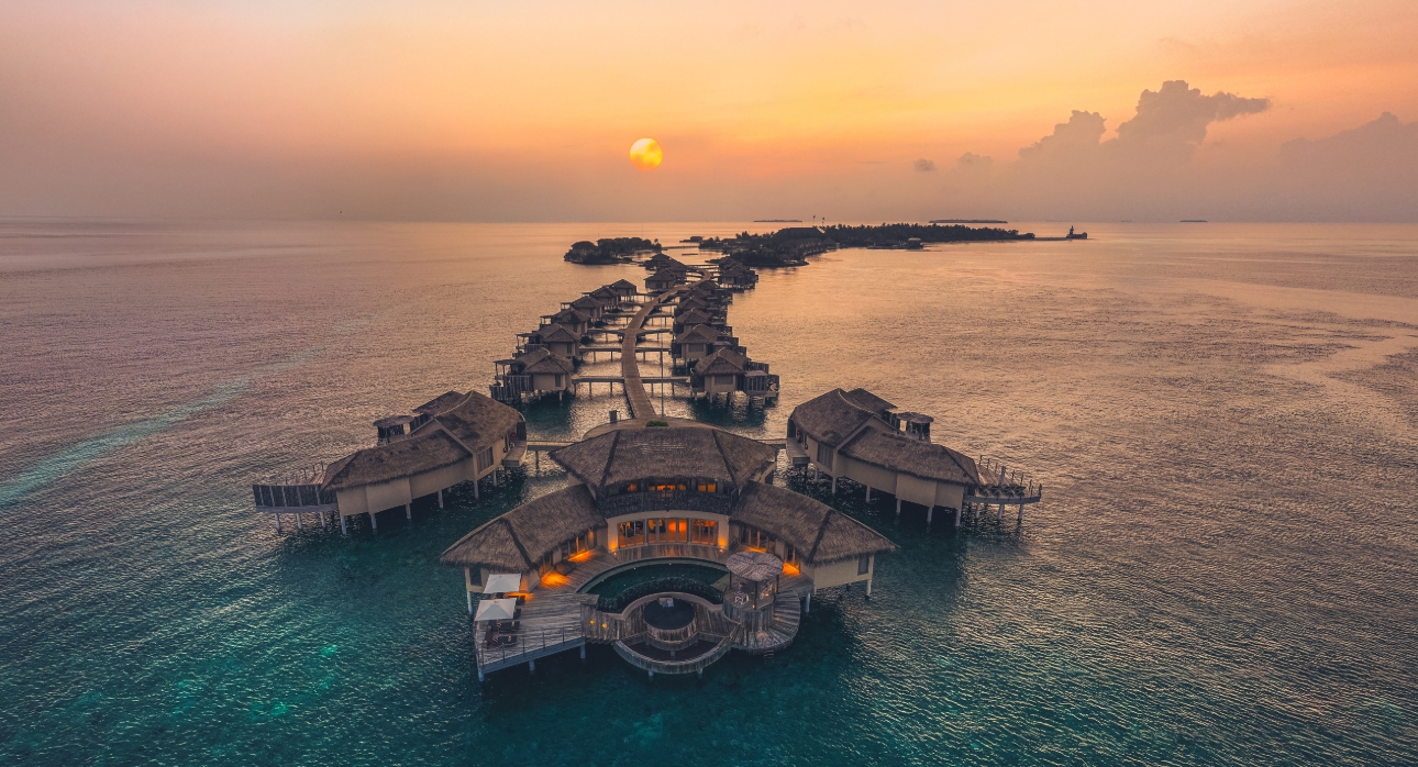 large luxury huts over water