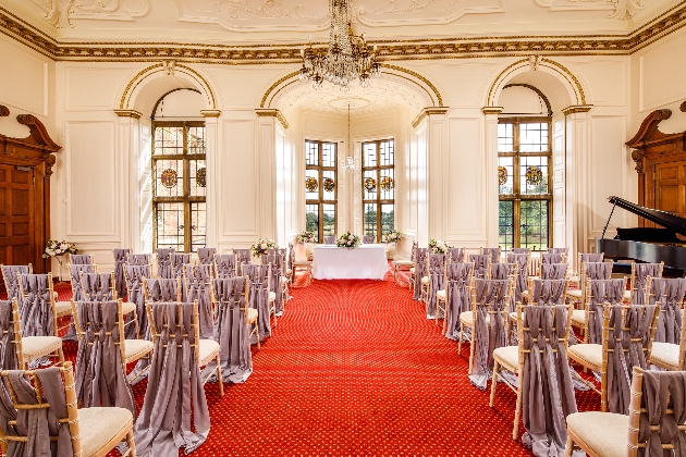 A room set up for a ceremony at MADINGLEY HALL & GARDENS