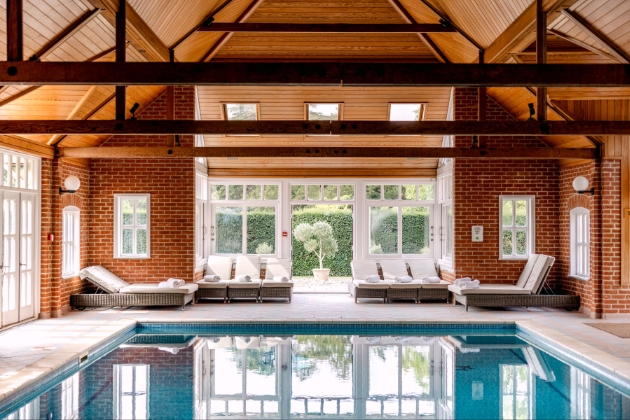 indoor pool with loungers