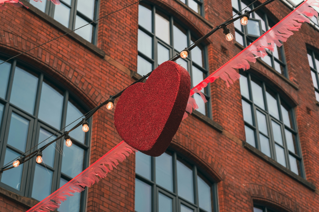 Manchester with a red heart streamer from buildings